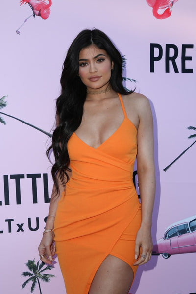 Orange Kylie Jenner Halter Asymmetrical V Neck Dress Prom Celebrity Formal Wrap Dress PrettyLittleThing.com Launch Party